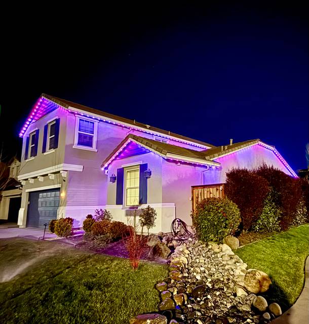 christmas lights installation on a house