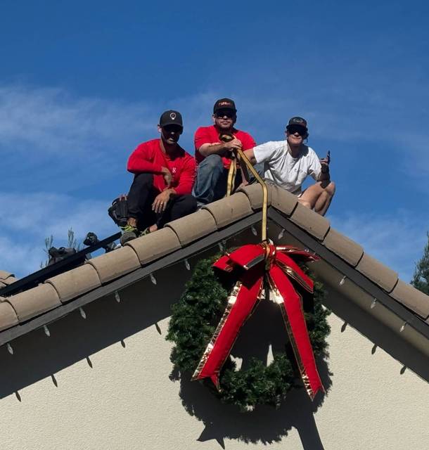 christmas lights installation on a house