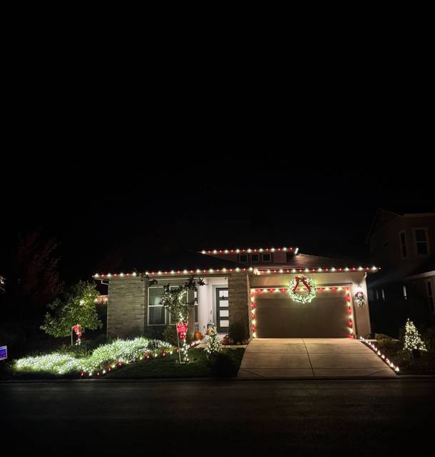 christmas lights installation on a house