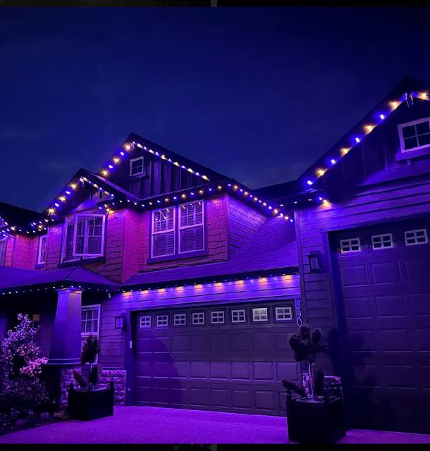 christmas lights installation on a house