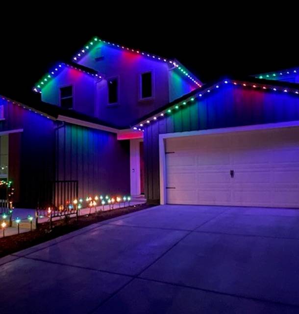 christmas lights installation on a house