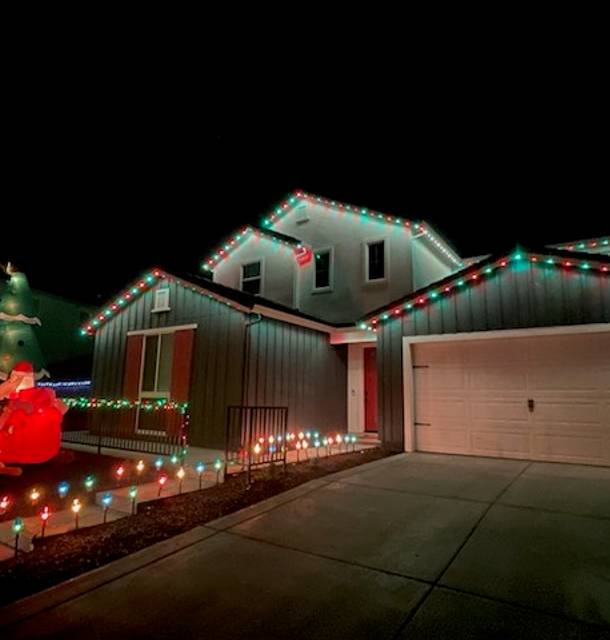 christmas lights installation on a house