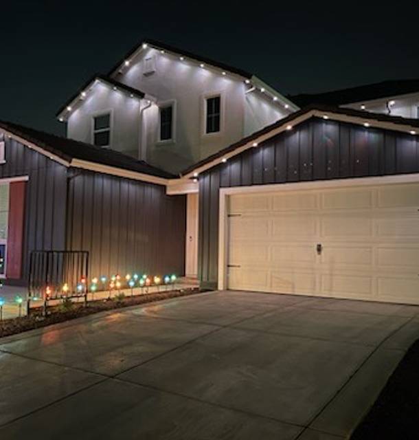 christmas lights installation on a house