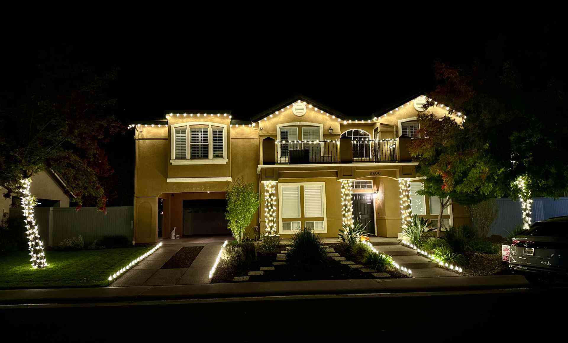 christmas lights installation on a house