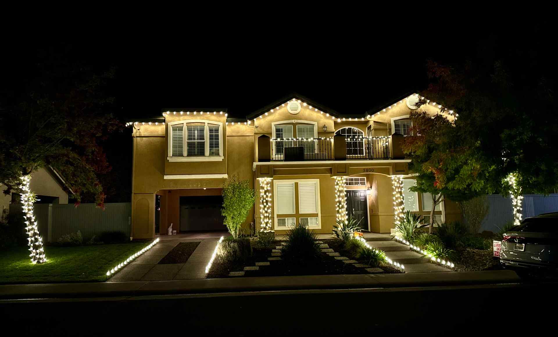 christmas lights installation on a house