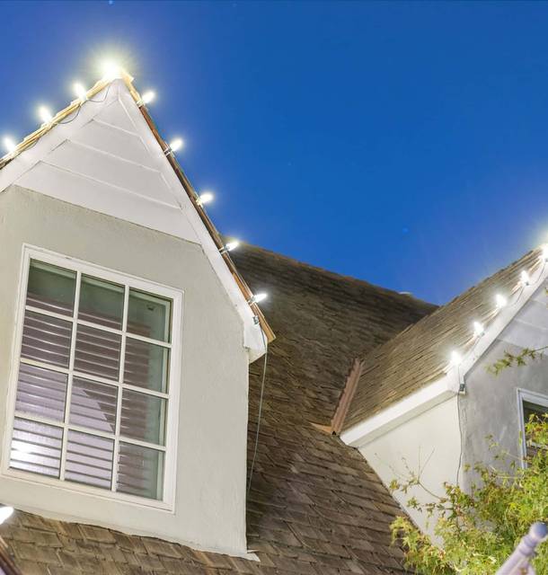 christmas lights installation on a house