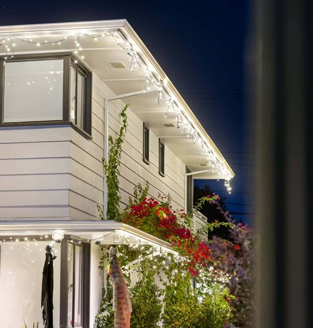 christmas lights installation on a house