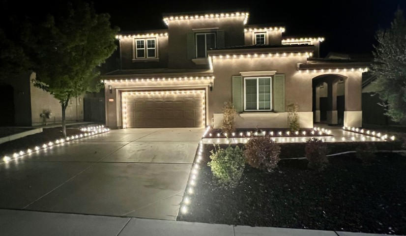 christmas lights installation on a house