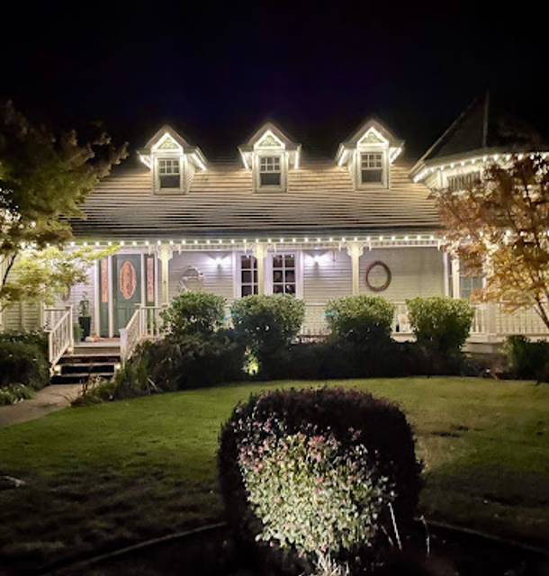 christmas lights installation on a house