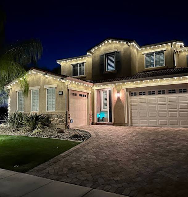 christmas lights installation on a house