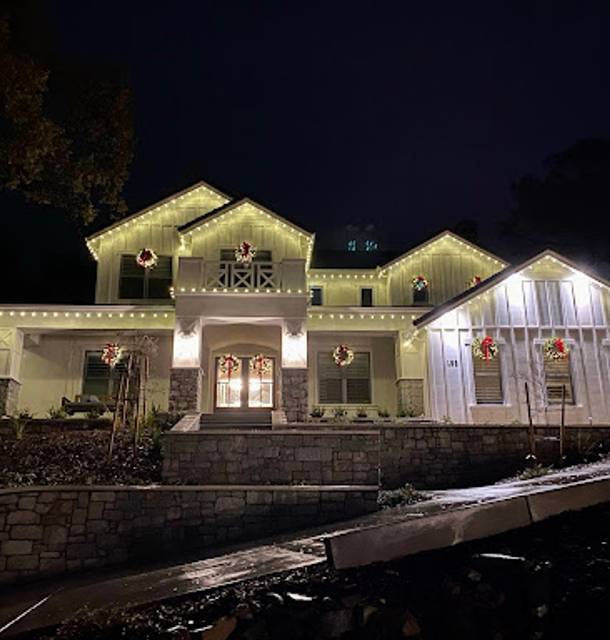 christmas lights installation on a house