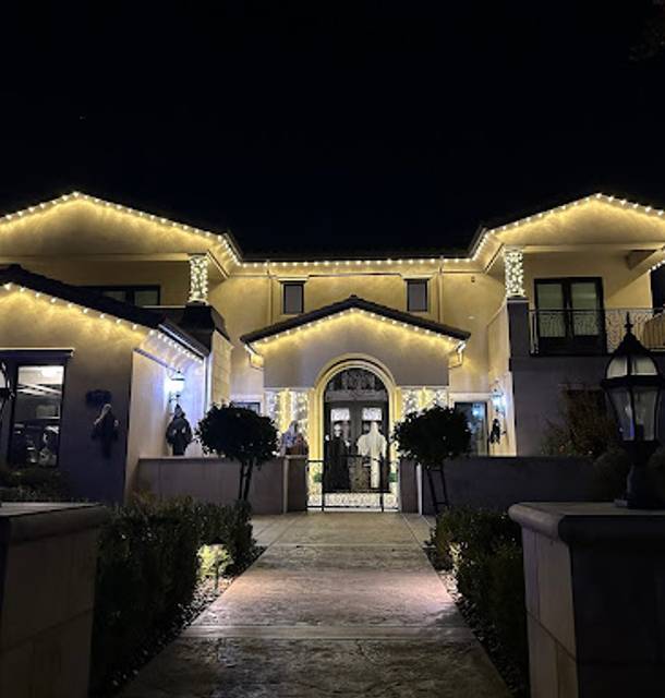 christmas lights installation on a house