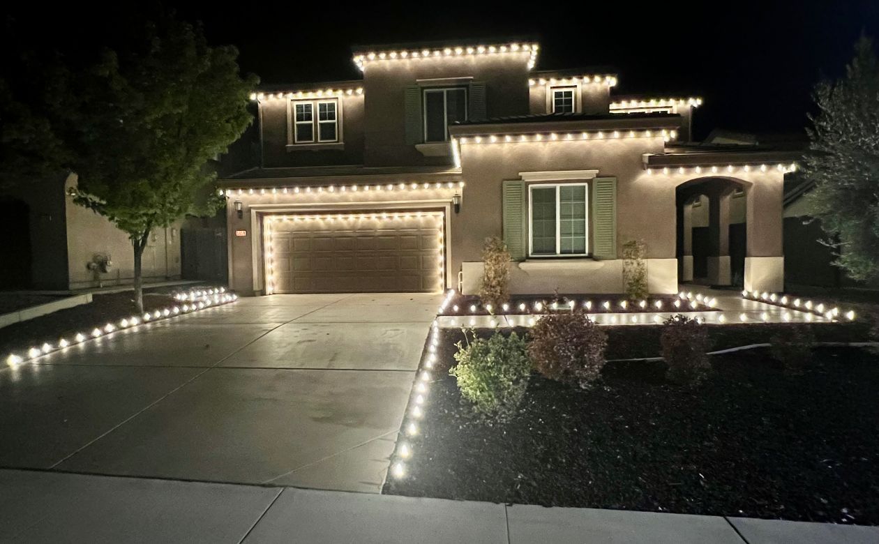 christmas lights installation on a house