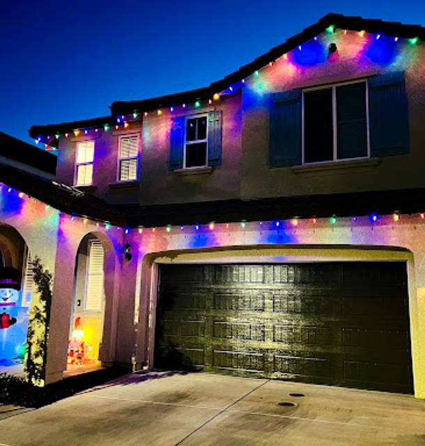 christmas lights installation on a house