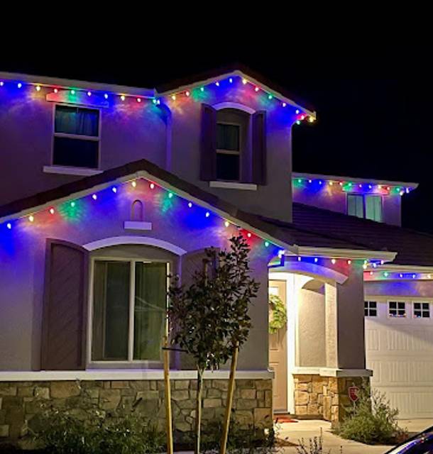 christmas lights installation on a house