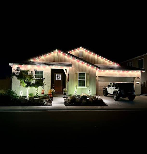 christmas lights installation on a house