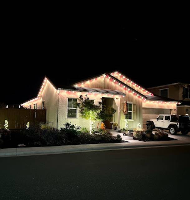 christmas lights installation on a house