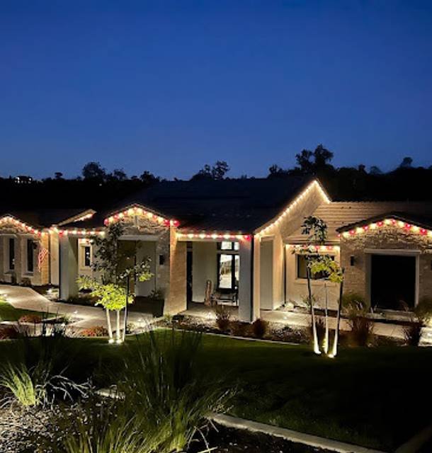 christmas lights installation on a house