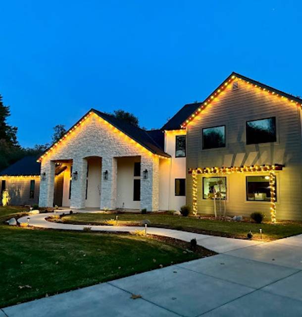 christmas lights installation on a house