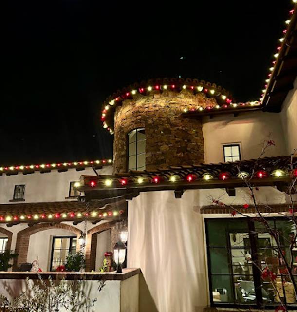 christmas lights installation on a house