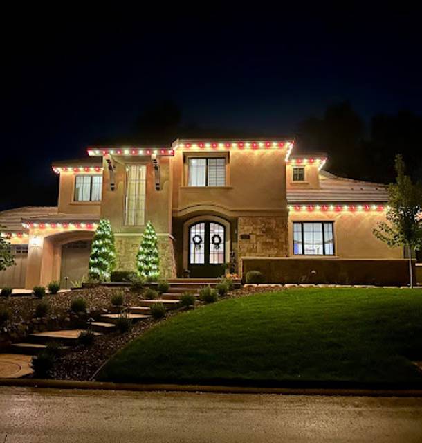 christmas lights installation on a house