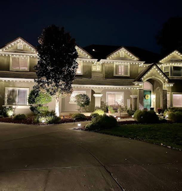 christmas lights installation on a house