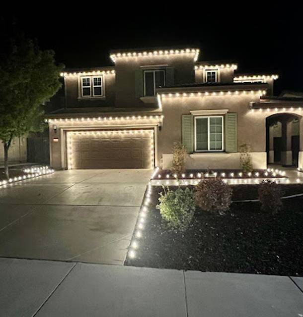 christmas lights installation on a house