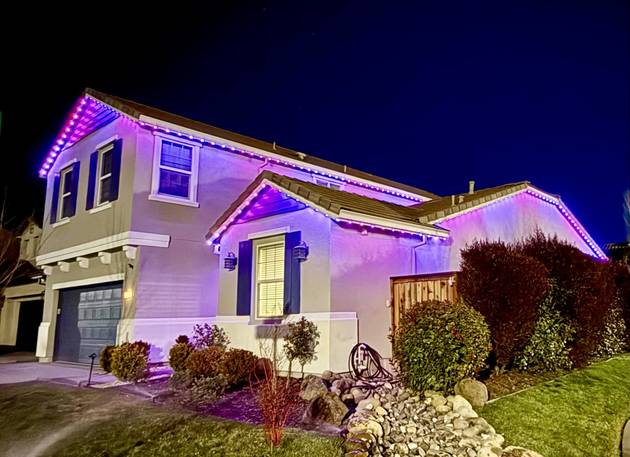 christmas lights installation on a house