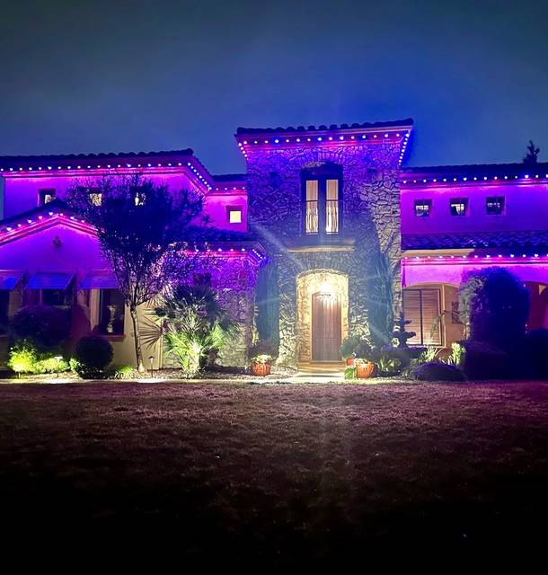 christmas lights installation on a house