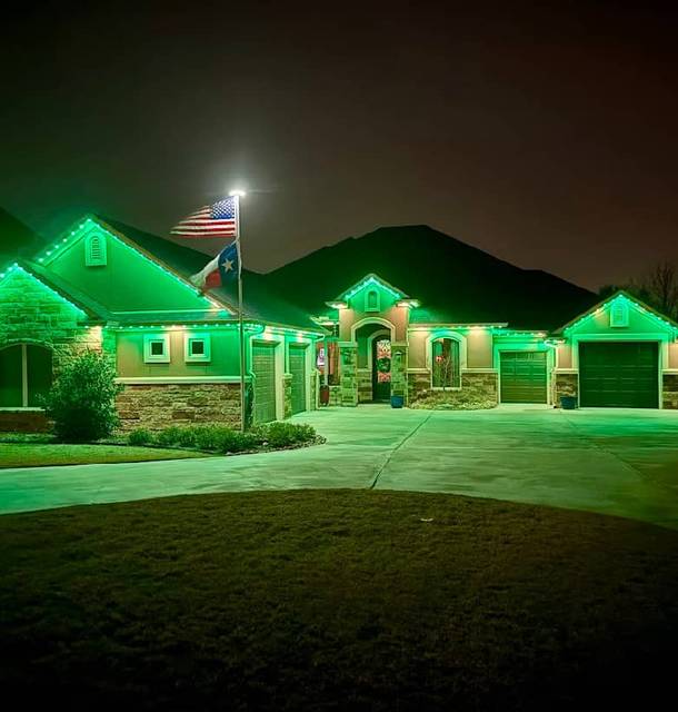 christmas lights installation on a house