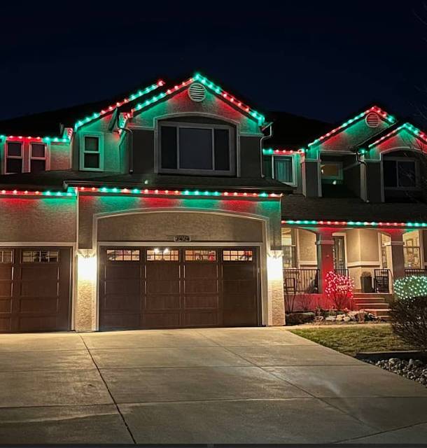 christmas lights installation on a house