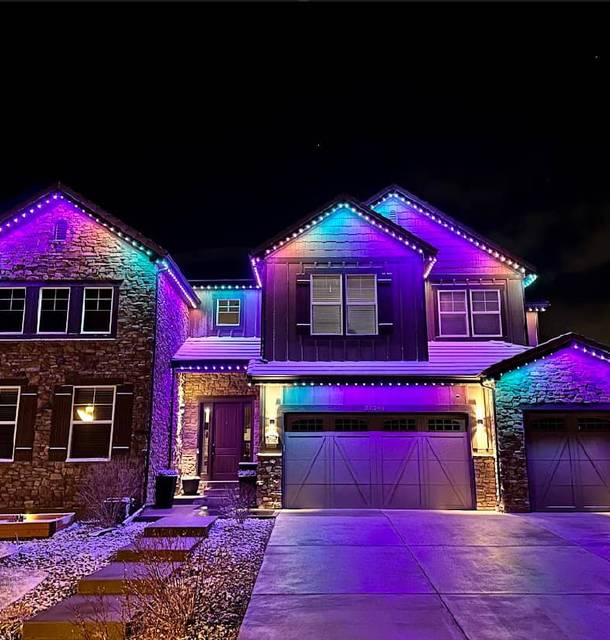 christmas lights installation on a house