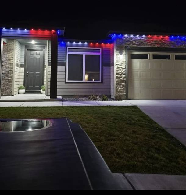 christmas lights installation on a house