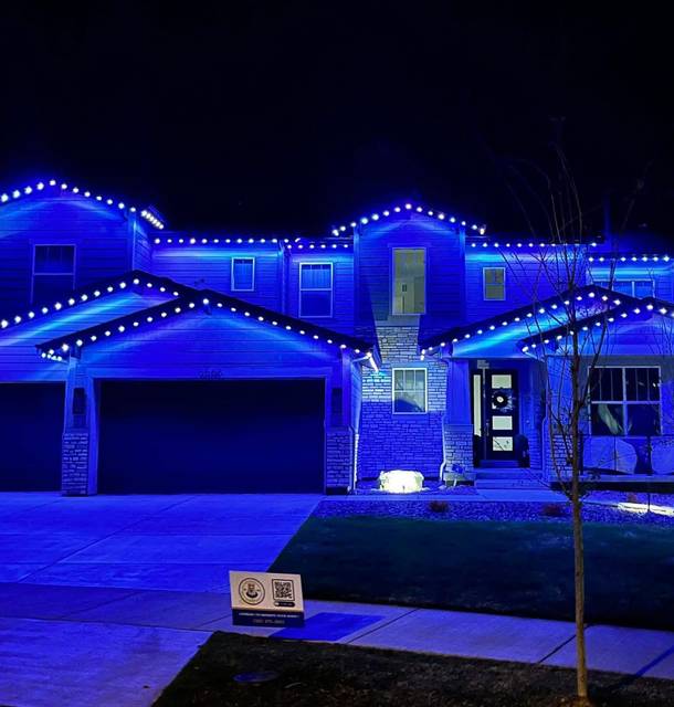 christmas lights installation on a house