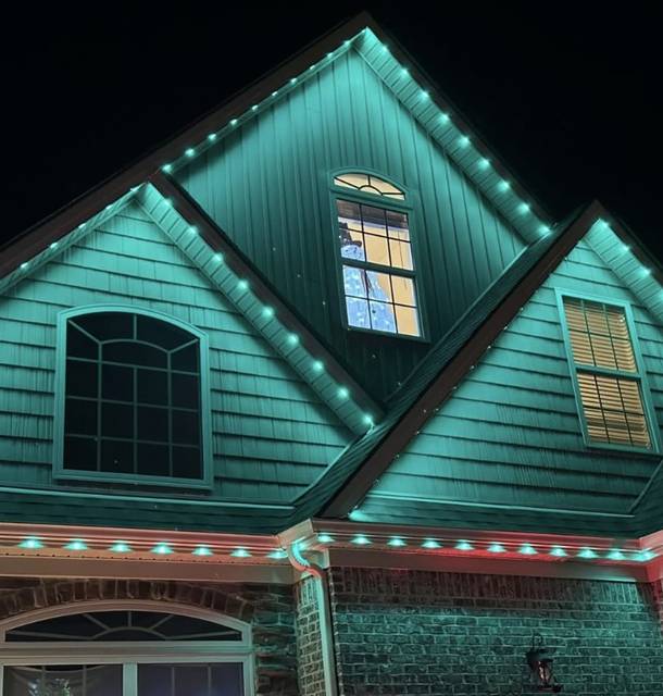 christmas lights installation on a house