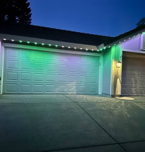 christmas lights installation on a house