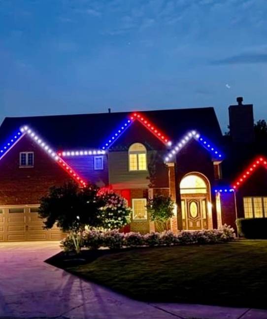 christmas lights installation on a house