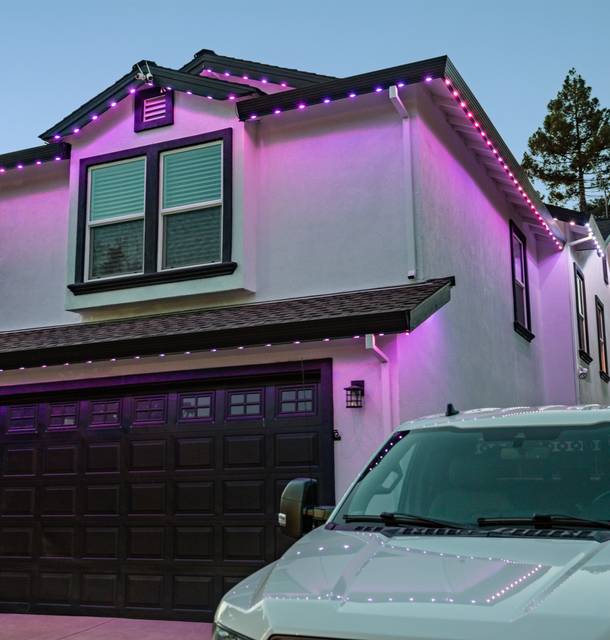 christmas lights installation on a house