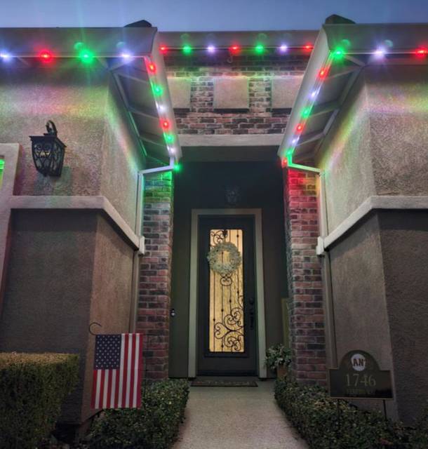 christmas lights installation on a house