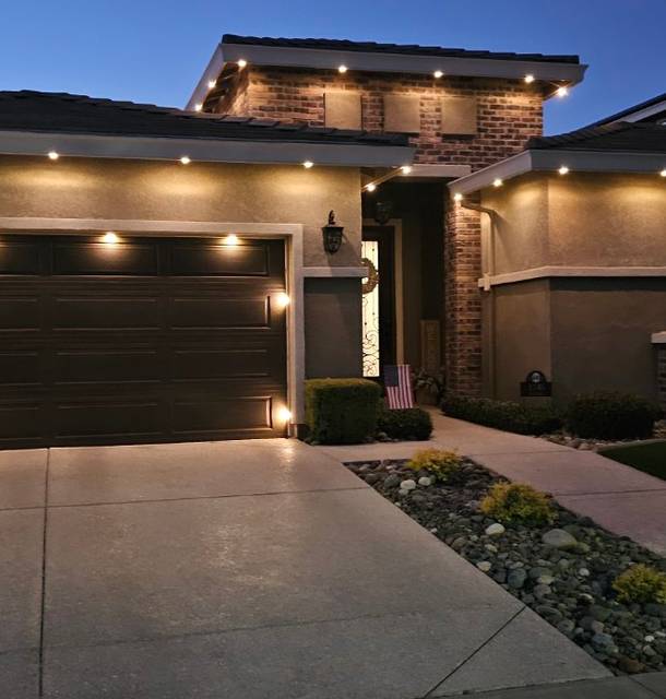 christmas lights installation on a house