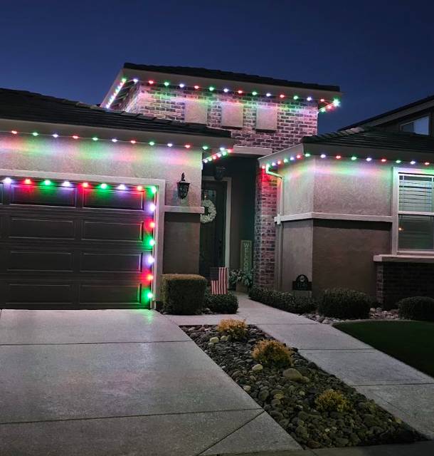 christmas lights installation on a house