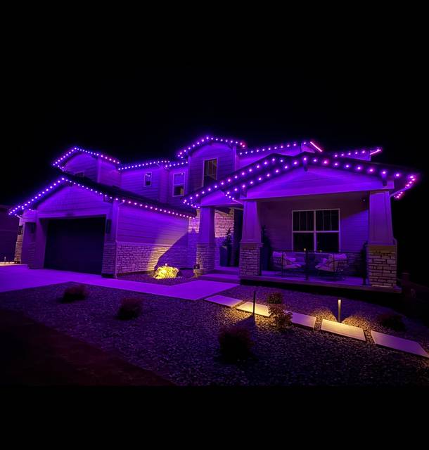 christmas lights installation on a house