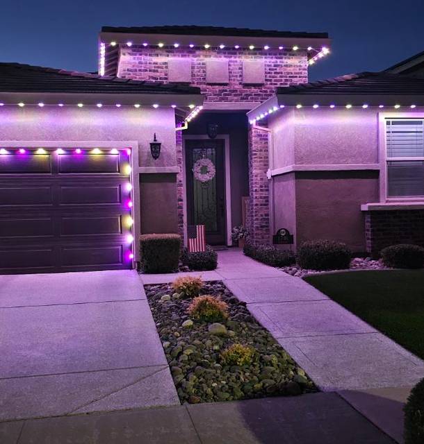 christmas lights installation on a house