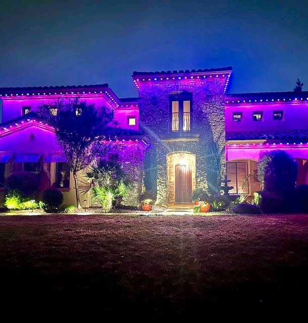 christmas lights installation on a house