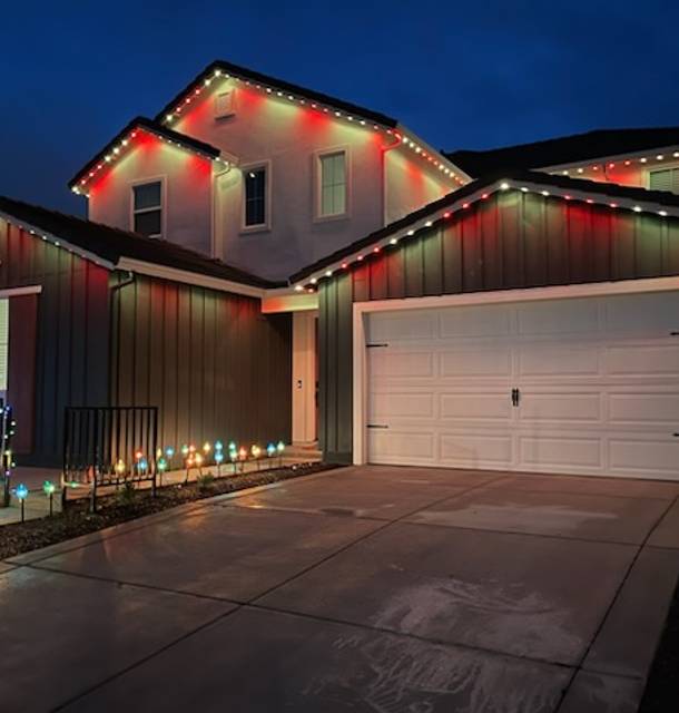 christmas lights installation on a house