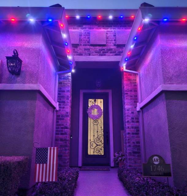 christmas lights installation on a house