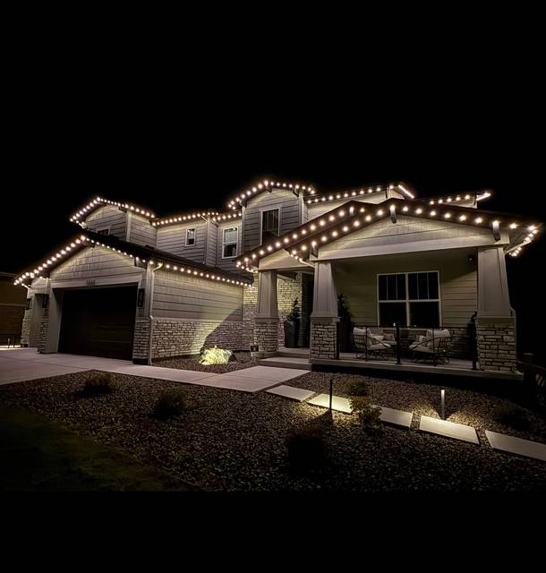 christmas lights installation on a house