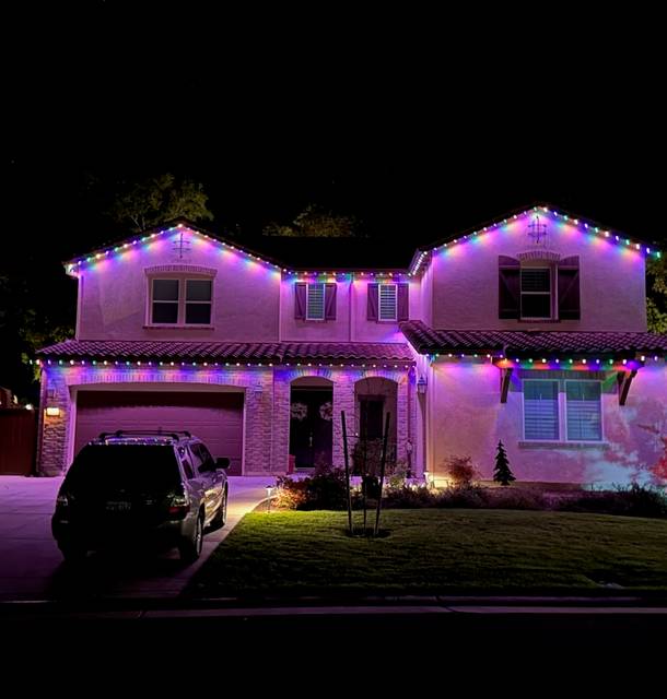 christmas lights installation on a house