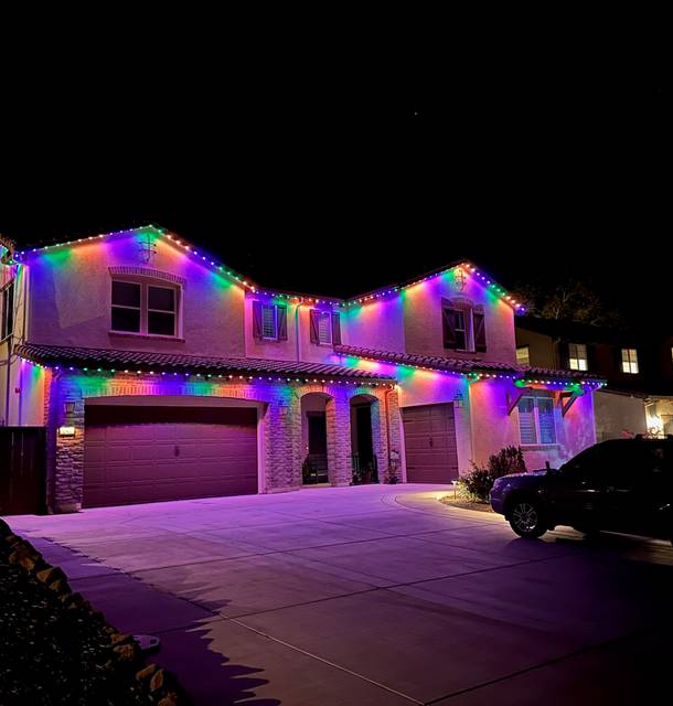christmas lights installation on a house