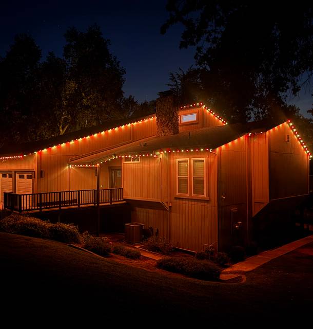 christmas lights installation on a house